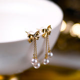 Faux Pearl Gold Bow Earrings 人造珍珠金蝴蝶结耳環 KJEA20118